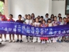 成都市新都区三河街道五龙社区关工委假日驿站开展发电机 DIY 亲子科普实践活动