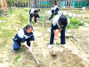 成都市新都区旃檀中学关工委开展“檀香园 春耕忙•种下希望盼秋实”劳动教育活动