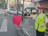 成都市新都区新繁街道金龙社区关工委组织应届大学生志愿者参与交通劝导活动