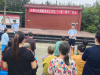 成都市新都区新繁街道新繁街道清白街村关工委开展传递交规 点亮文明——学生志愿宣传实践行动